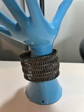 Wide antiqued metal mesh basket cuff bracelet.